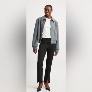 Black slim fit split hem trousers